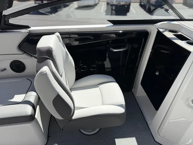 Slide: The Image of 2025 Yamaha Boats AR250 interior with sleek seating and modern design. - 48