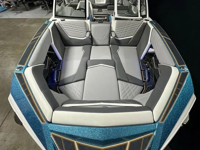 Slide: The Image of 2025 Tigé 25ZX boat interior with luxurious seating and modern design. - 14