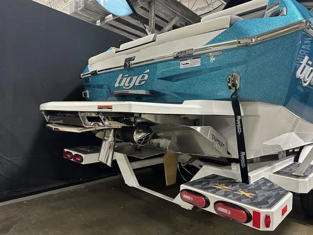Slide: The Image of 2025 Tigé 25ZX boat rear view, showcasing sleek design and advanced features. - 4