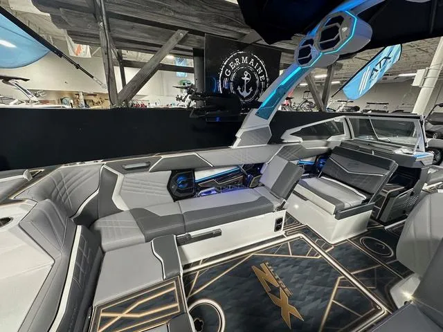 Slide: The Image of 2025 Tigé 25ZX boat interior with sleek seating and modern design elements. - 7