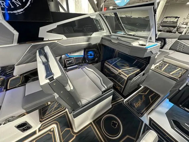 Slide: The Image of 2025 Tigé 25ZX boat interior with modern seating and sleek design elements. - 9
