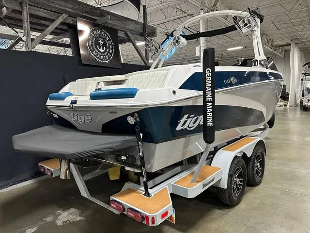 Slide: The Image of 2022 Tigé Z1 boat on trailer at Germaine Marine showroom. - 4