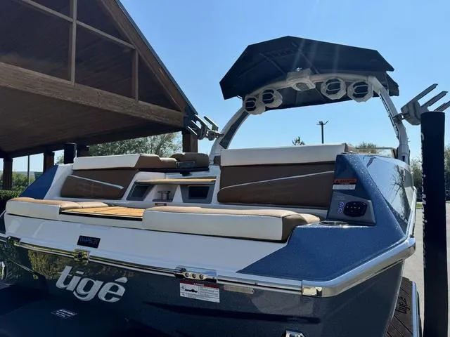 Slide: The Image of 2025 Tigé 23ZX Ultre boat with sleek design and modern features. - 6