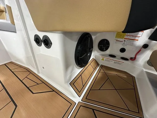 Slide: The Image of Interior of 2023 ATX Boats 22 TYPE-S, featuring speaker and stylish flooring. - 13