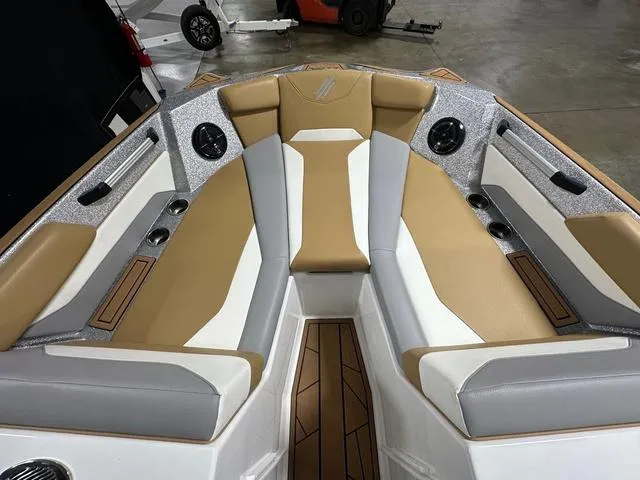 Slide: The Image of 2023 ATX Boats 22 TYPE-S interior with tan and white seating, modern design. - 16