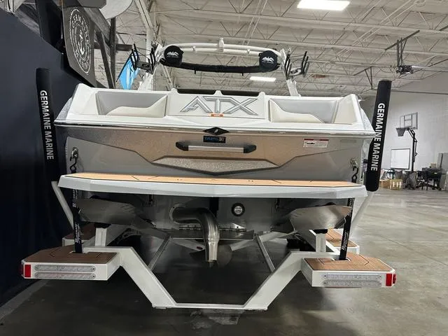 Slide: The Image of 2023 ATX Boats 22 TYPE-S displayed indoors, rear view with Germaine Marine branding. - 5