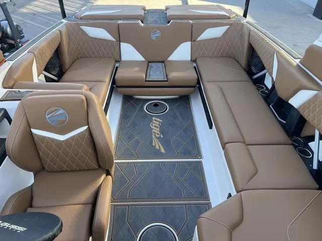 Slide: The Image of 2025 Tigé Z3 boat interior with luxurious tan seating and stylish design. - 8