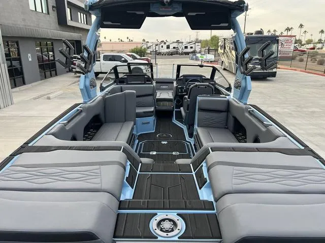 Slide: The Image of 2025 Supra SE 575 boat interior with luxurious seating and modern design. - 9