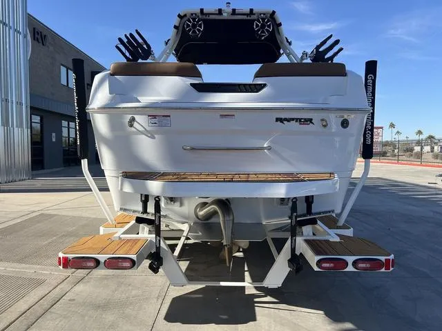 Slide: The Image of 2025 Moomba Max boat rear view with swim platform and Raptor engine. - 7