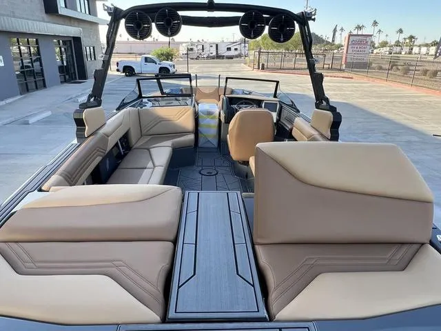 Slide: The Image of 2025 ATX Boats 24 TYPE-S interior with beige seating and modern design. - 10