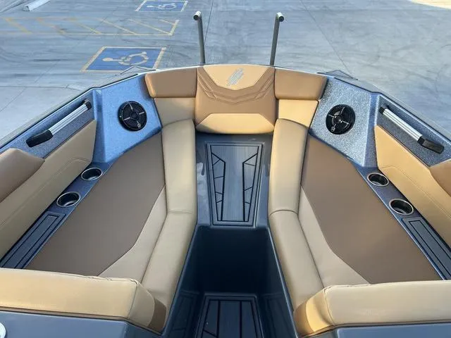 Slide: The Image of 2025 ATX Boats 24 TYPE-S interior with tan seating and modern design. - 11
