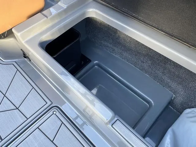 Slide: The Image of Storage compartment in 2025 ATX Boats 24 TYPE-S, featuring sleek design and ample space. - 14