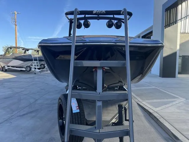 Slide: The Image of 2025 ATX Boats 24 TYPE-S on trailer, front view in outdoor setting. - 3