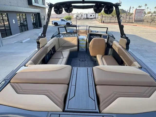 Slide: The Image of 2025 ATX Boats 24 TYPE-S interior with tan seating and modern design. - 9