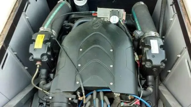 Slide: The Image of 2009 Centurion Elite V C4 Air Warrior engine compartment with visible components and wiring. - 11