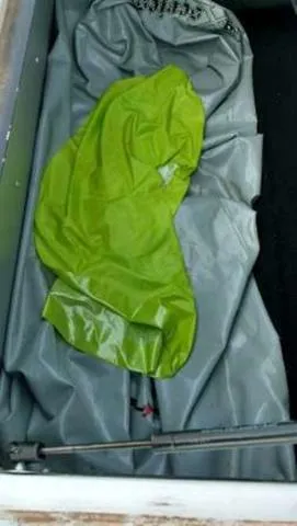 Slide: The Image of Green tarp on gray surface in 2009 Centurion Elite V C4 Air Warrior. - 13