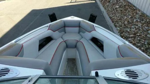 Slide: The Image of 2009 Centurion Elite V C4 Air Warrior boat interior with cushioned seating. - 7