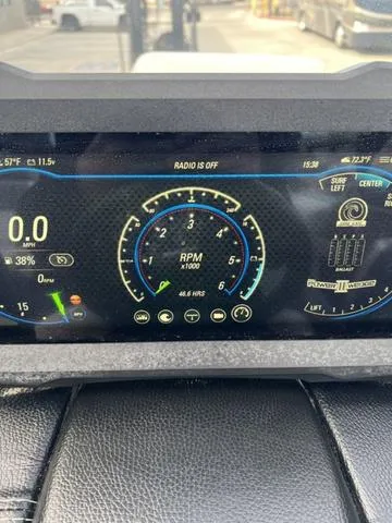 Slide: The Image of Dashboard of a 2021 Malibu 23 MXZ boat showing RPM and other controls. - 12