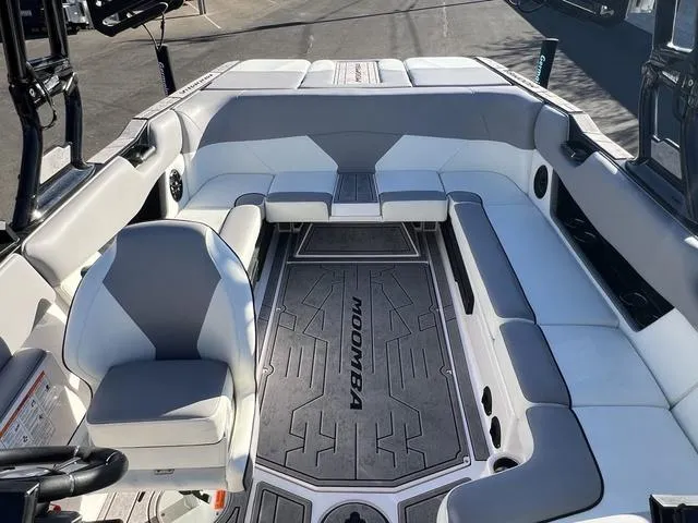 Slide: The Image of 2023 Moomba Max boat interior with spacious seating and modern design. - 9