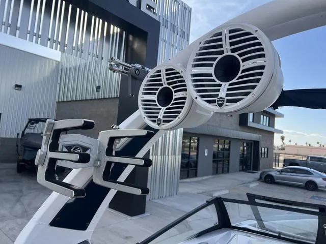 Slide: The Image of 2020 Tigé 25ZX boat with tower speakers and wakeboard rack. - 12