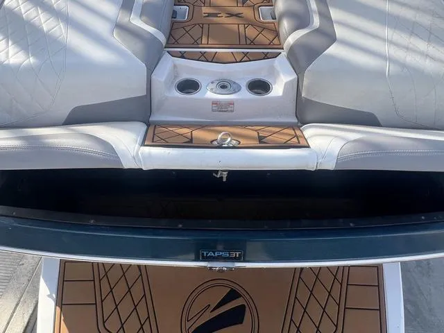 Slide: The Image of 2020 Tigé 25ZX boat interior with cushioned seating and TAPS 3T system. - 13