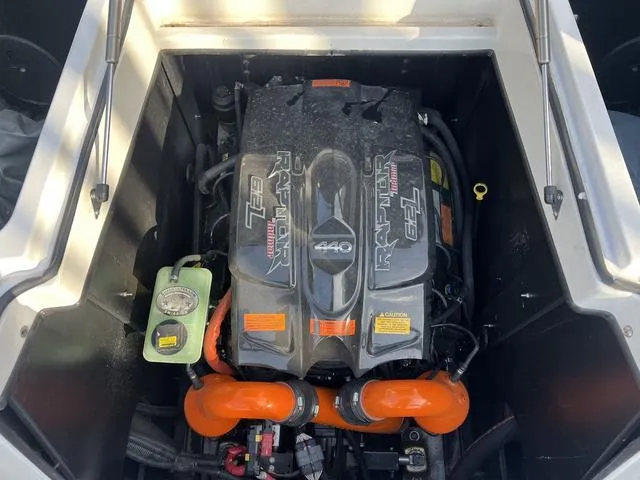 Slide: The Image of 2020 Tigé 25ZX boat engine, featuring Raptor 6.2L V8, in engine compartment. - 14