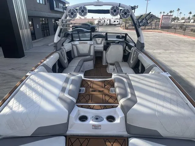 Slide: The Image of 2020 Tigé 25ZX boat interior with luxury seating and sound system. - 9