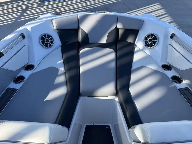 Slide: The Image of 2022 ATX Boats 22 TYPE-S interior with gray seating and built-in speakers. - 9