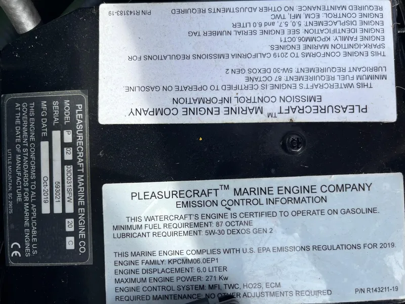 Slide: The Image of Emission control labels on a 2020 Nautique GS22 marine engine. - 41