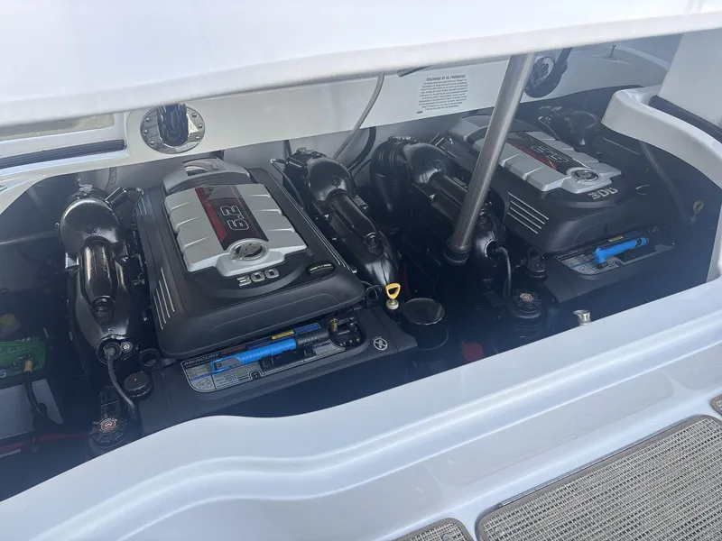 Slide: The Image of 2016 Cobalt 302 boat engine compartment with dual 6.2L engines. - 17