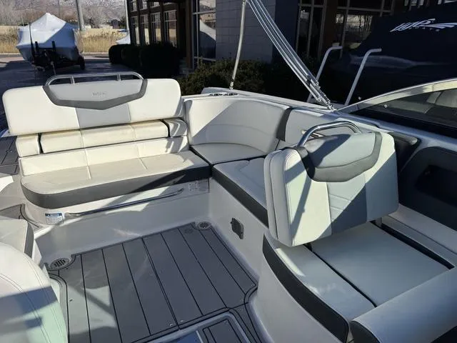 Slide: The Image of 2024 Chaparral 247 SSX boat interior with luxurious seating and modern design. - 16