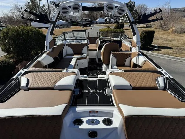 Slide: The Image of 2025 Tigé 24RZX boat interior with luxurious seating and modern design. - 14