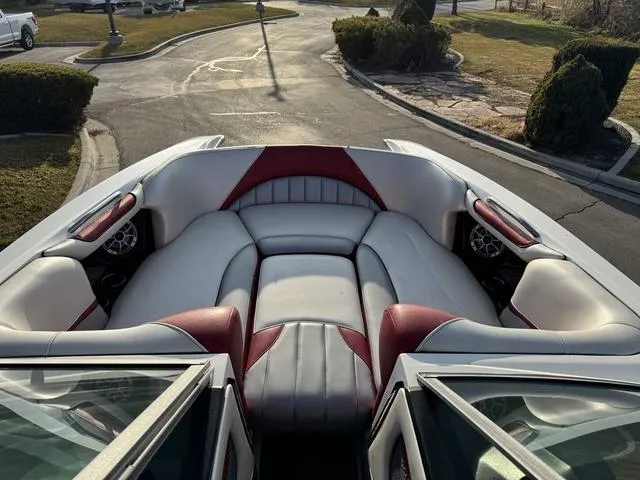 Slide: The Image of 2014 MB SPORTS F24 Tomcat boat interior with white and red seating. - 15