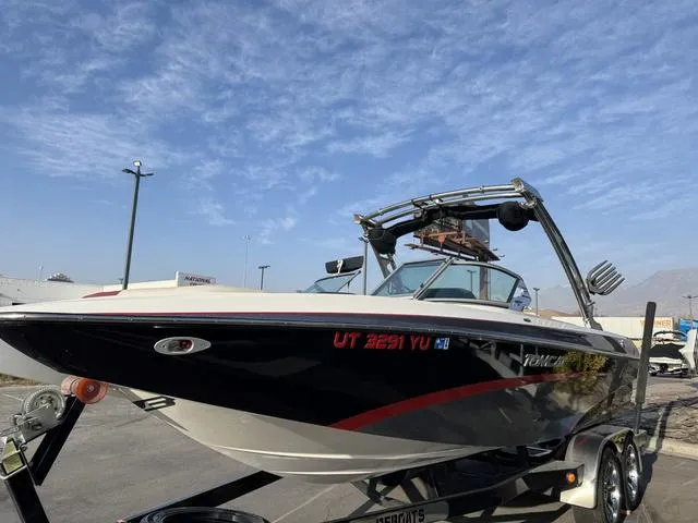 Slide: The Image of 2014 MB SPORTS F24 Tomcat boat on trailer under clear sky. - 5