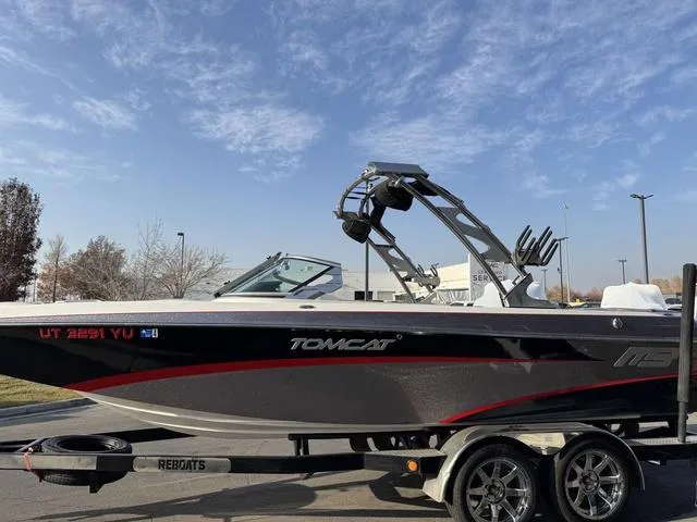 Slide: The Image of 2014 MB SPORTS F24 Tomcat boat on trailer under clear sky. - 6