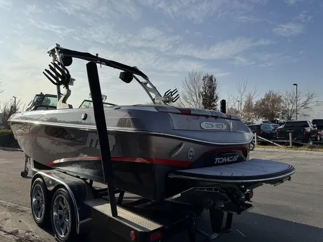 Slide: The Image of 2014 MB SPORTS F24 Tomcat boat on trailer, parked outdoors under a clear sky. - 7