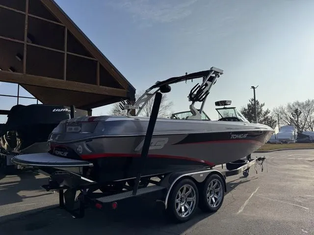 Slide: The Image of 2014 MB SPORTS F24 Tomcat boat on trailer, parked outdoors under clear sky. - 8