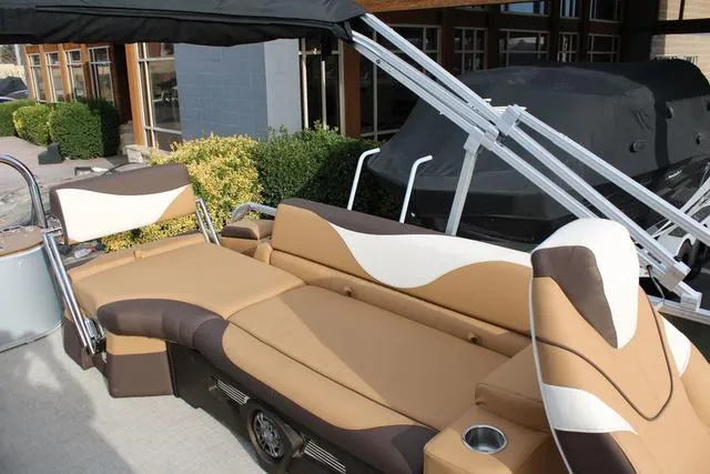 Slide: The Image of 2025 Avalon LSV Quad Lounger Shift with luxurious tan and white seating. - 7