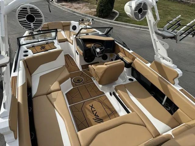 Slide: The Image of 2023 ATX Boats 22 TYPE-S interior with tan seating and modern dashboard design. - 10