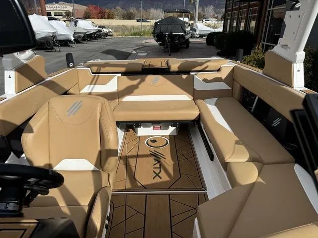 Slide: The Image of 2023 ATX Boats 22 TYPE-S interior with tan seating and sleek design. - 13