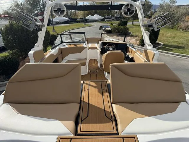 Slide: The Image of 2023 ATX Boats 22 TYPE-S interior with tan seating and modern design. - 16