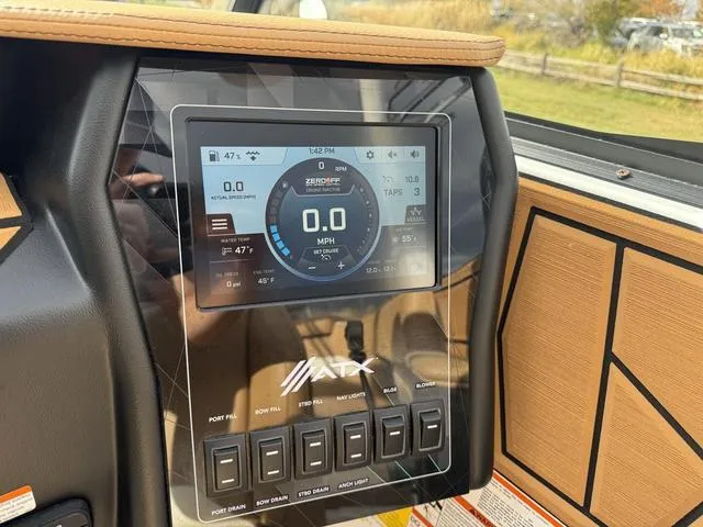 Slide: The Image of 2023 ATX Boats 22 TYPE-S dashboard with digital display and control panel. - 17