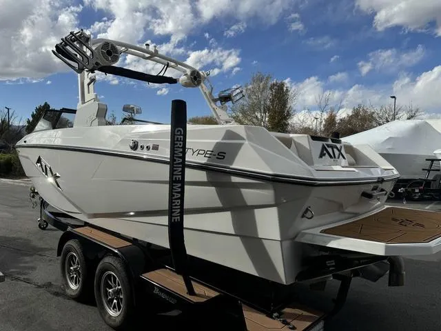 Slide: The Image of 2023 ATX Boats 22 TYPE-S on trailer, sleek design under cloudy sky. - 5