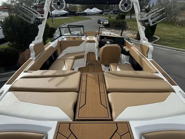 Slide: The Image of 2023 ATX Boats 22 TYPE-S interior with tan seating and modern design. - 9