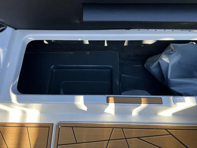 Slide: The Image of Storage compartment of 2024 ATX Boats 24 TYPE-S with wooden deck detail. - 15