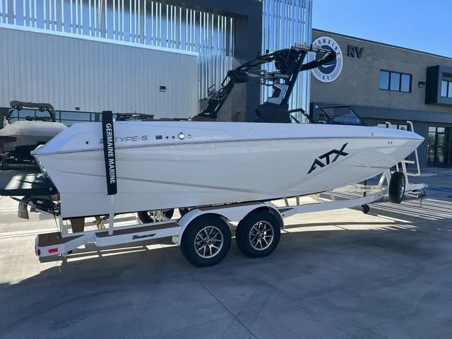 Slide: The Image of 2024 ATX Boats 24 TYPE-S on trailer, displayed outdoors at a dealership. - 3