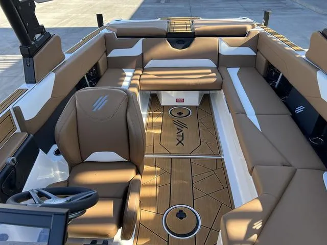 Slide: The Image of 2024 ATX Boats 24 TYPE-S interior with tan and white seating, modern design, and spacious layout. - 9