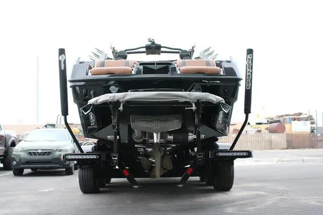 Slide: The Image of 2024 Malibu 26 LSV boat interior with luxurious tan seating and modern design. - 4