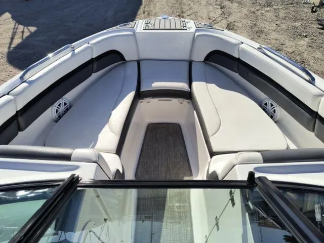 Slide: The Image of 2016 Chaparral Vortex 223 VRX boat interior with spacious seating and modern design. - 11