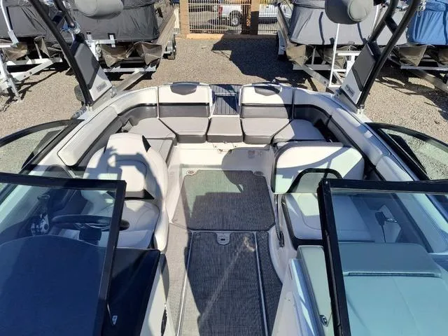 Slide: The Image of 2016 Chaparral Vortex 223 VRX boat interior with spacious seating and modern design. - 13